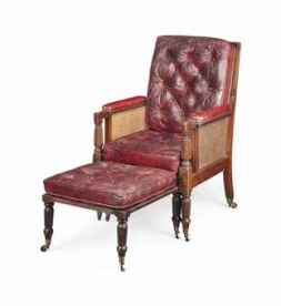 A LATE VICTORIAN MAHOGANY LIBRARY ARMCHAIR