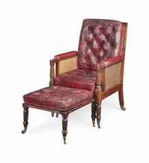 A LATE VICTORIAN MAHOGANY LIBRARY ARMCHAIR